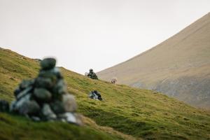 Ancient cairn, village path